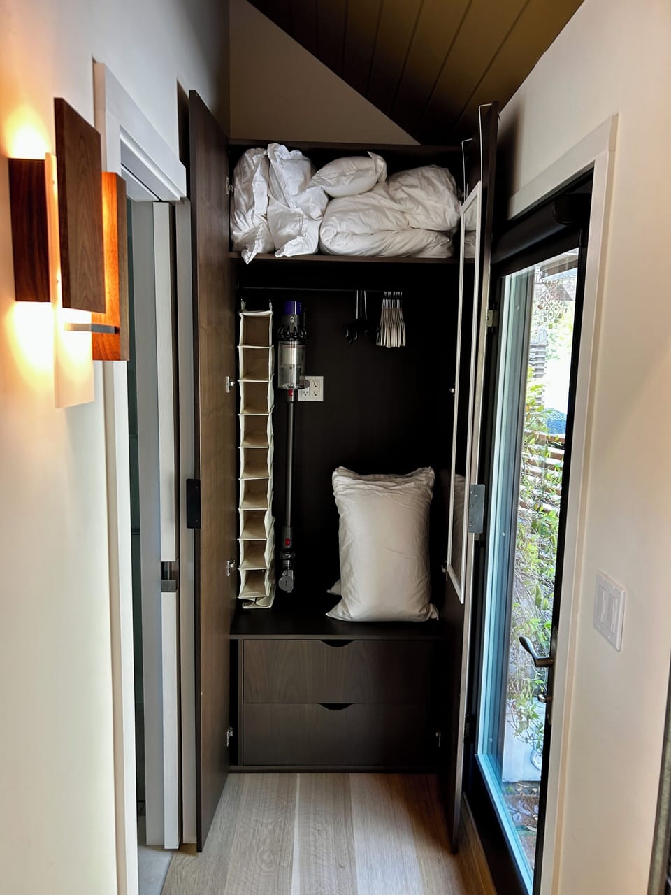 Wardrobe Hall Closet includes 2 drawers, Dyson stick vacuum, shoe rack, hangers