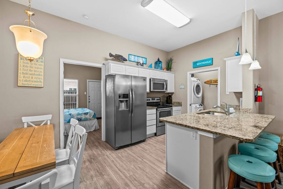 Cook, chat, and laugh in this open-concept coastal kitchen