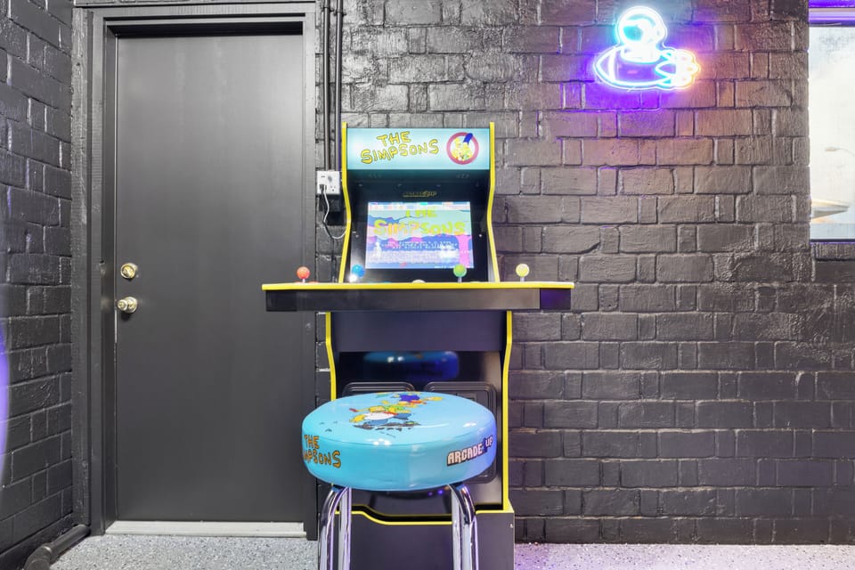 Retro game room with Pac-Man and Simpsons arcade fun!