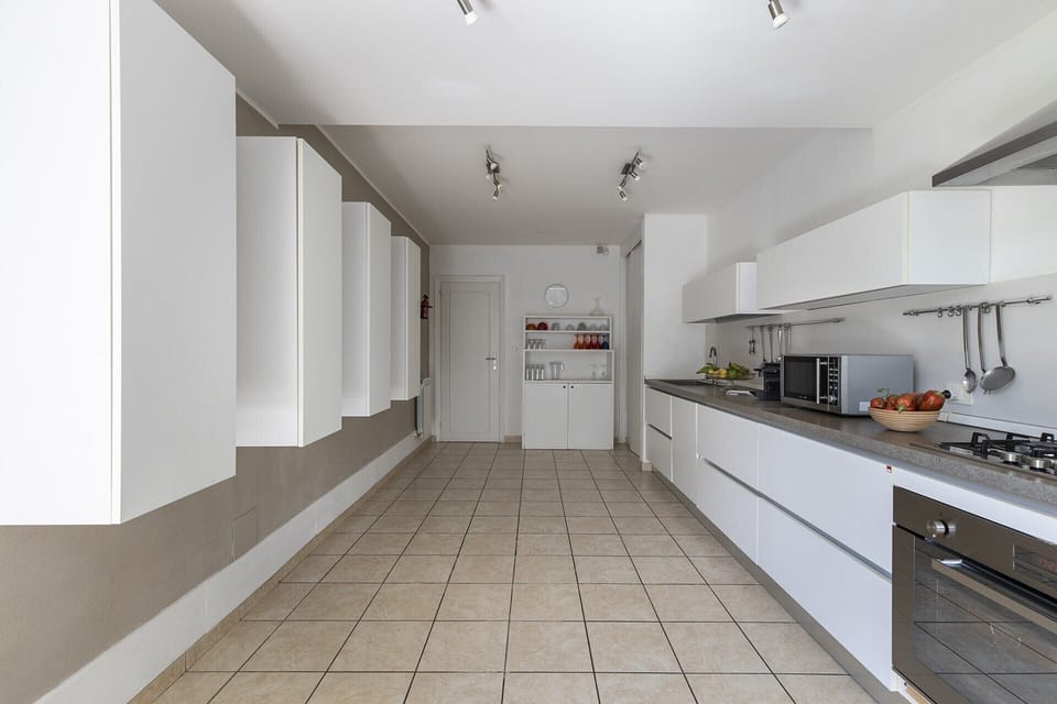 The large, well-equipped kitchen.