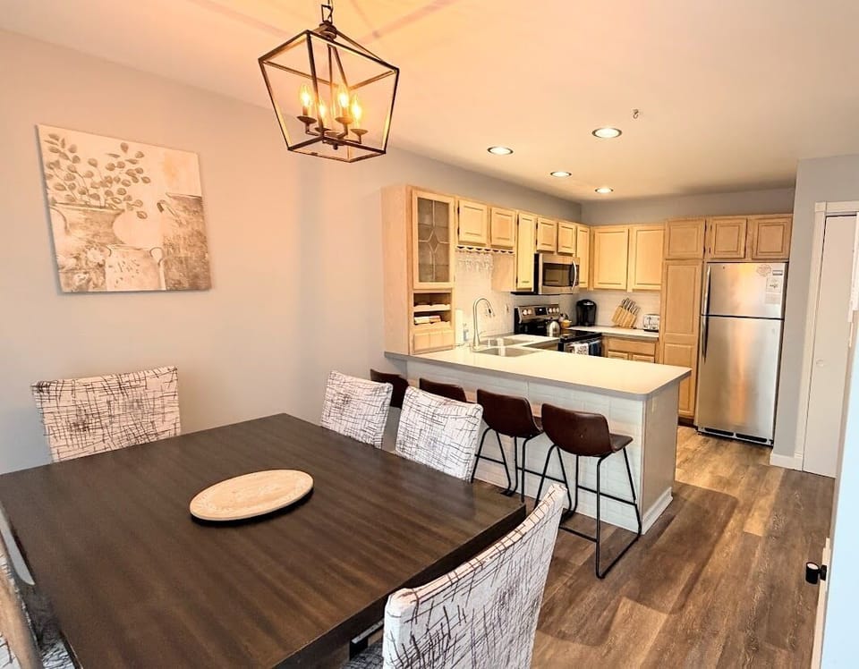 Open-concept kitchen and dining area with plenty of seating for everyone. 