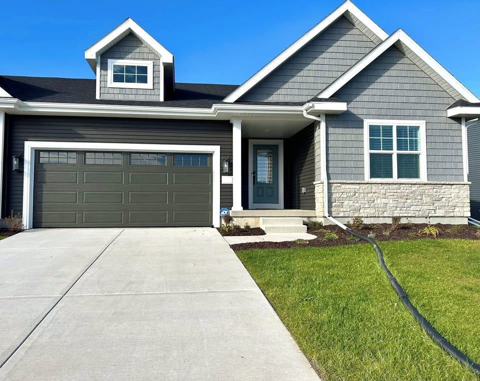 Front view with two-car garage