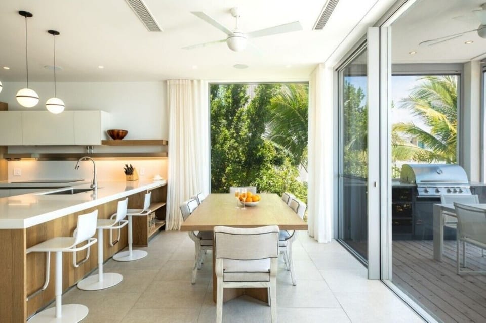 Gather for breezy meals in your open, sunlit kitchen.