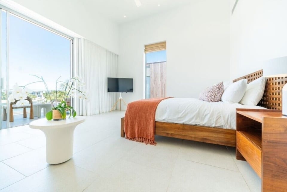Wake up refreshed in an airy suite with terrace views.