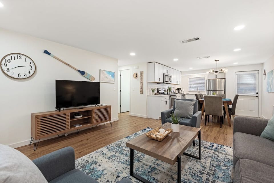 The cozy living room has plenty of comfy seating!