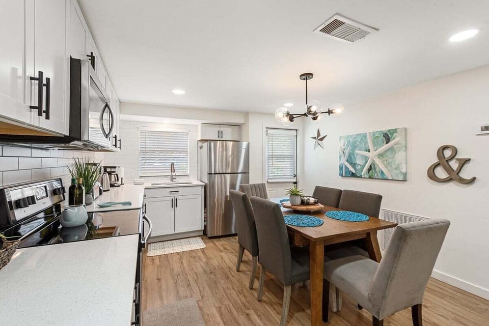 Beautiful, clean appliances and spacious countertops for cooking.