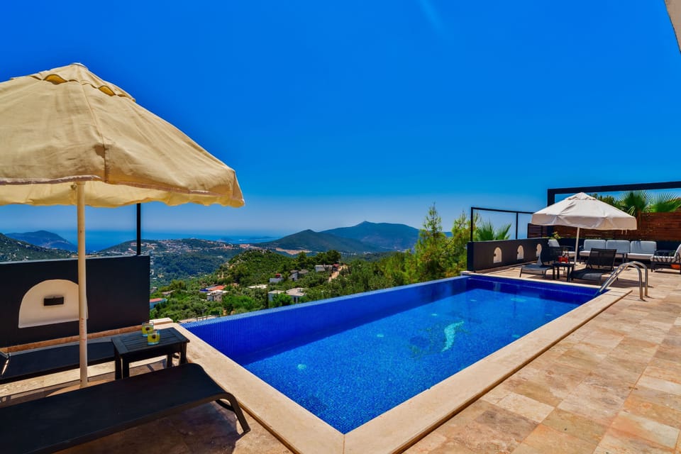 Relax by the pool with terrace and stunning view