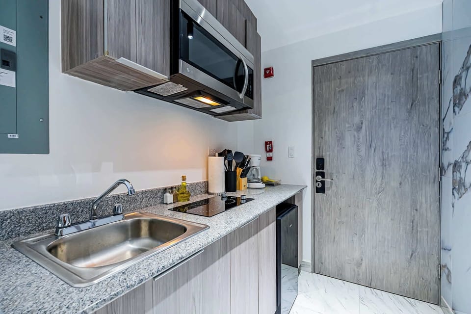 Open layout connecting the bedroom and dining area