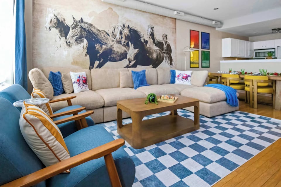 Living Room: Modern Comfort, Timeless Warmth – Thoughtfully designed with plush seating, natural light, and calming tones, this space is the heart of your stay.