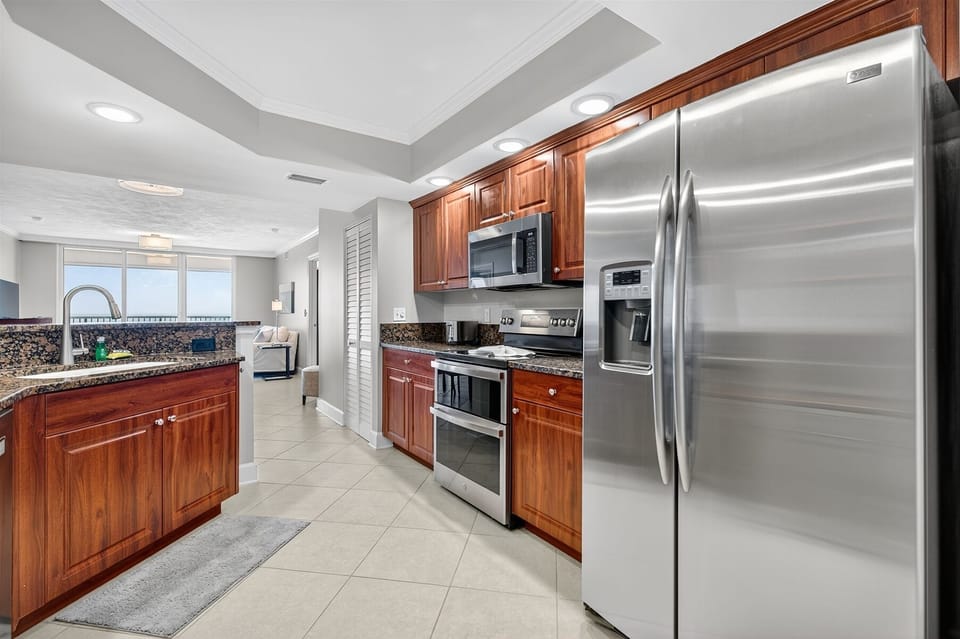 Large kitchen with stainless steel appliances