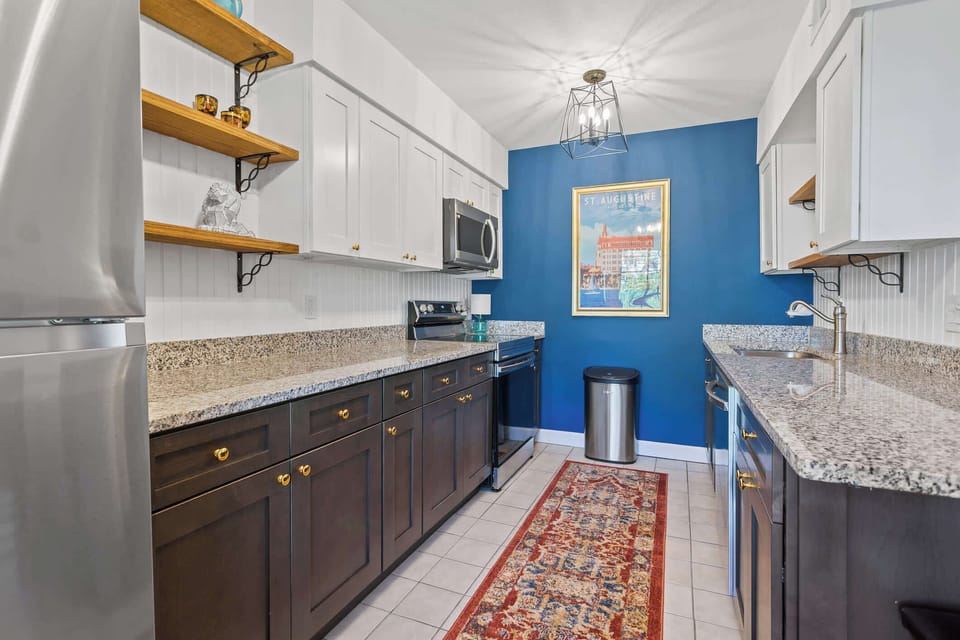 A chef's delight! Full kitchen with stainless steel appliances awaits you.