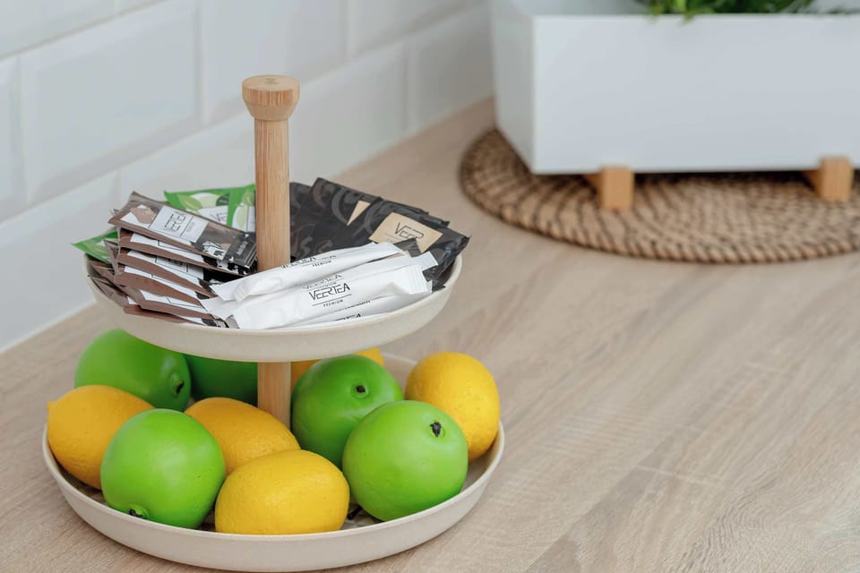 Bowl of fresh fruit – A cheerful, colorful touch to the kitchen table.
