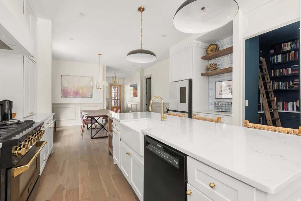 Gourmet kitchen with modern appliances, chic decor, and natural light awaits!