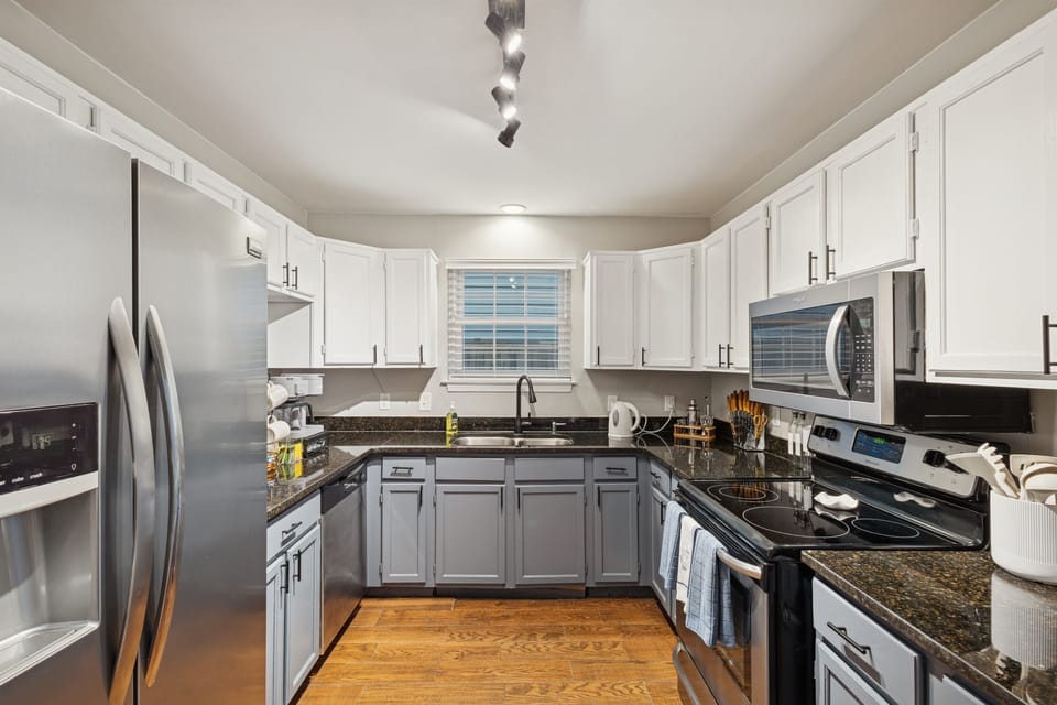 Whip up your favorite meals in a fully stocked kitchen with modern appliances and cookware.