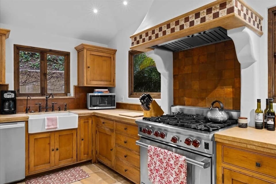 36" Wolf range and farmhouse sink 