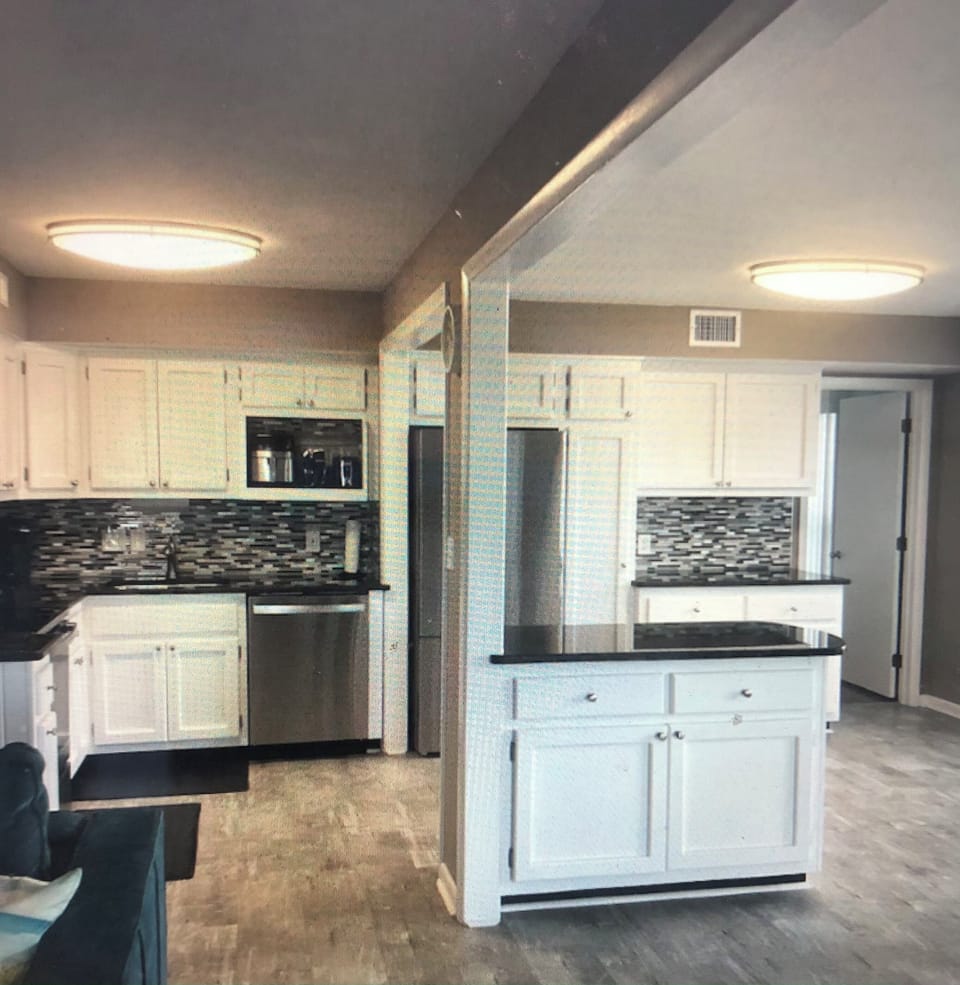 Open kitchen with coffee bar with drip coffee maker and a Keurig coffee maker