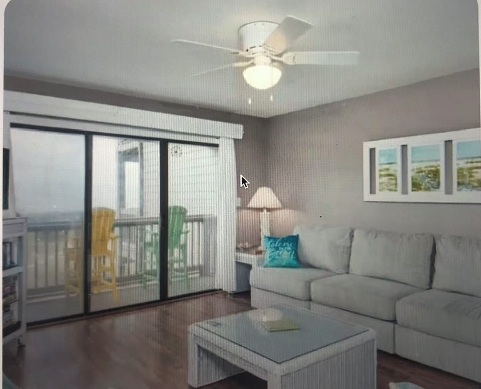 Living area with two couches and view of ocean! 