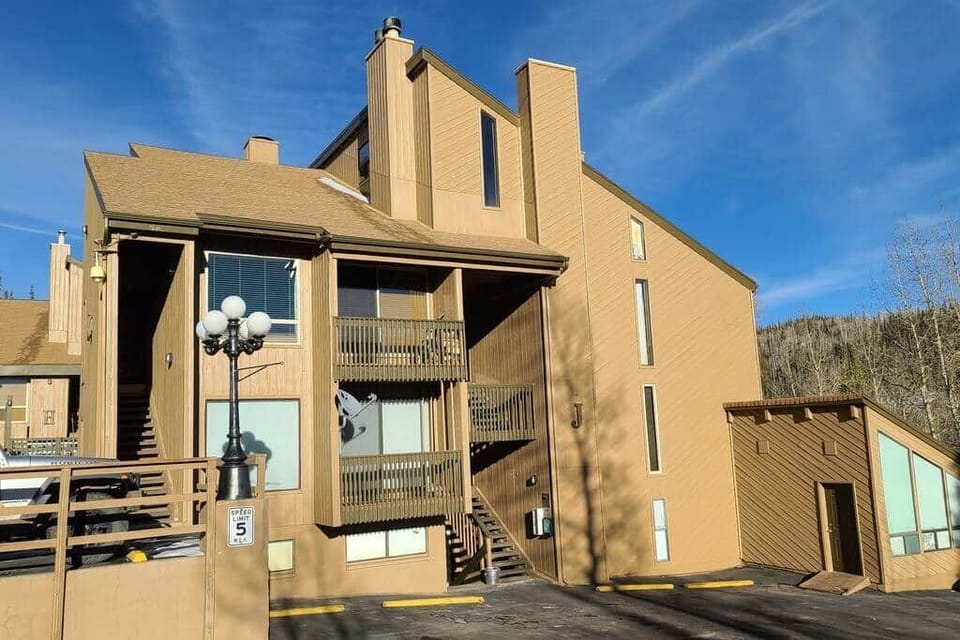 Front view of building J with parking directly in front of building
