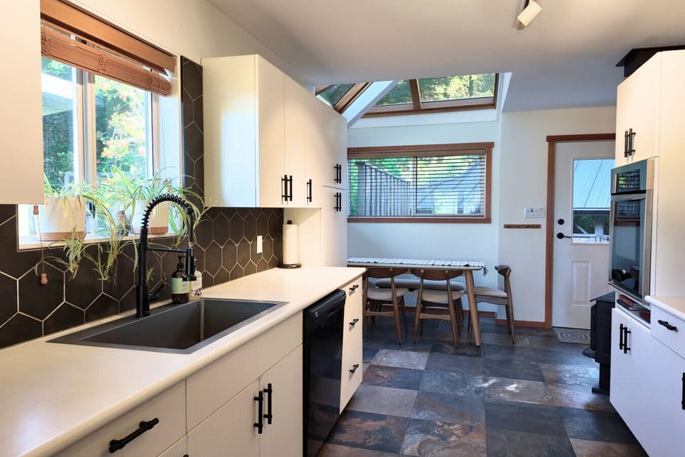 Galley kitchen stocked with essentials