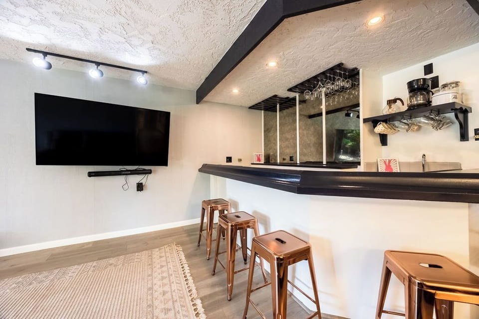 Den and Wet bar area.
