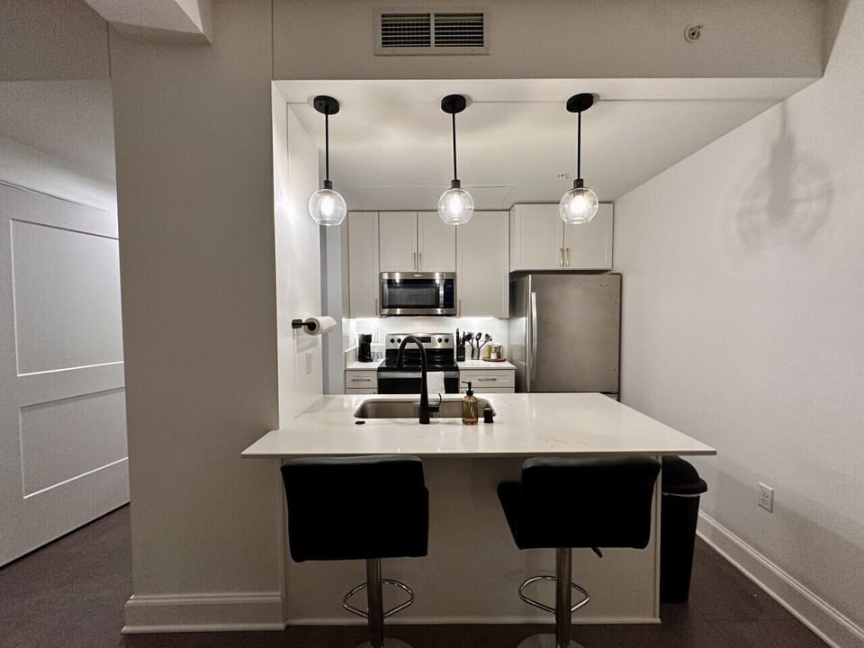 Full kitchen with bar stool seating