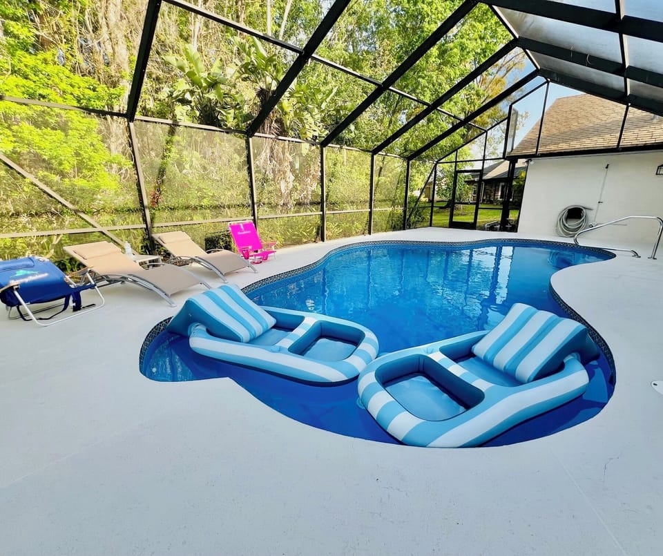 Lounge chairs & pool floats make this a relaxing place to spend your days.