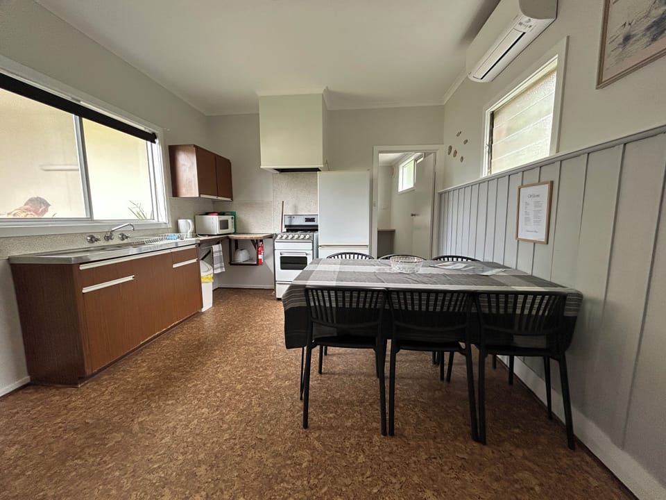 Fully equipped kitchen and dining area