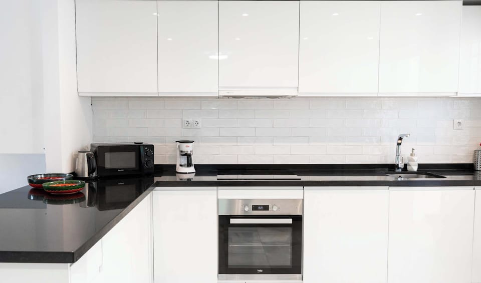 The kitchen is modernly furnished with a Scandinavian touch ensuring full comfort for all your daily meals
