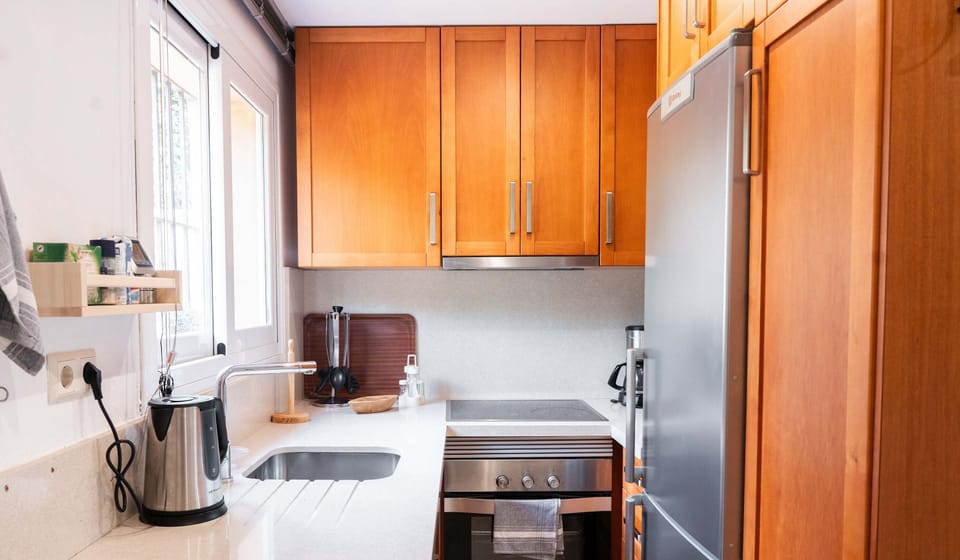 Kitchen is modernly equipped with all installations needed for a comfortable stay. One of few properties with both a washer, stove, microwave, oven, fridge, refrigerator and coffee machine available to all guests. 