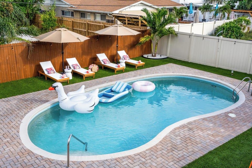 Sun-soaked pool days with plush loungers, shade umbrellas and fun floats