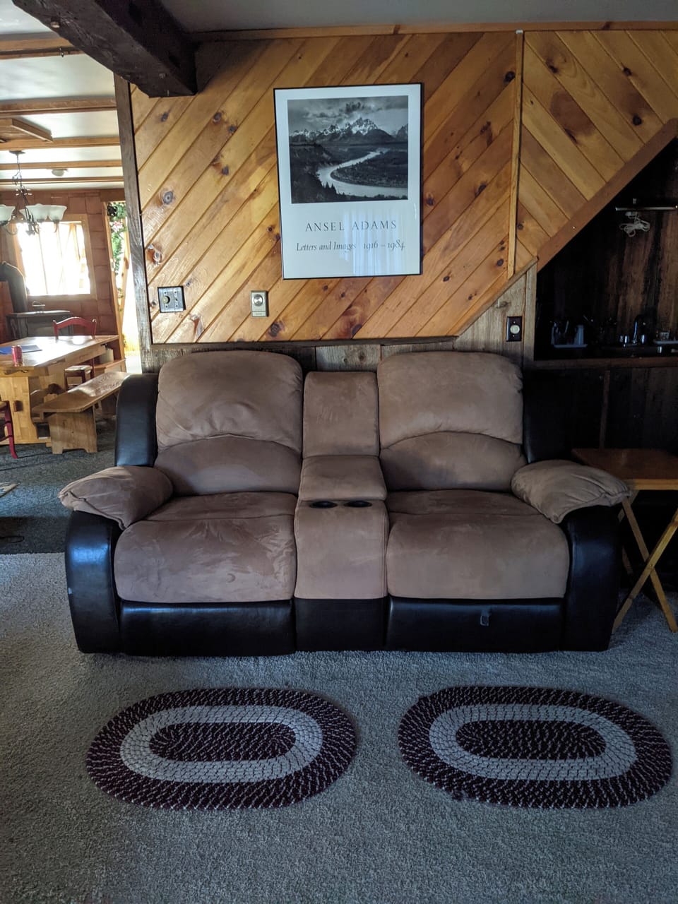Love seat reclines on both sides