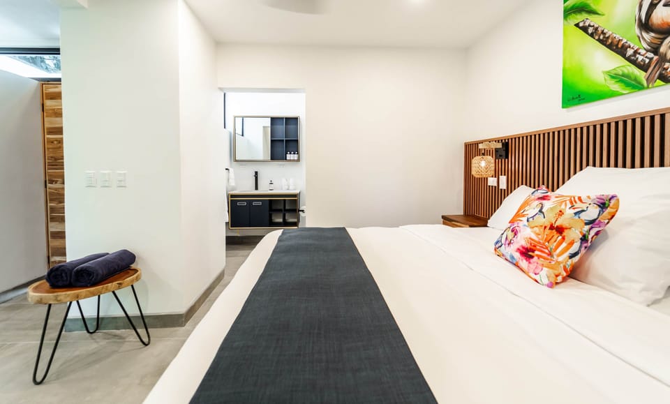 King bedroom in detached apartment just steps away from the pool area.