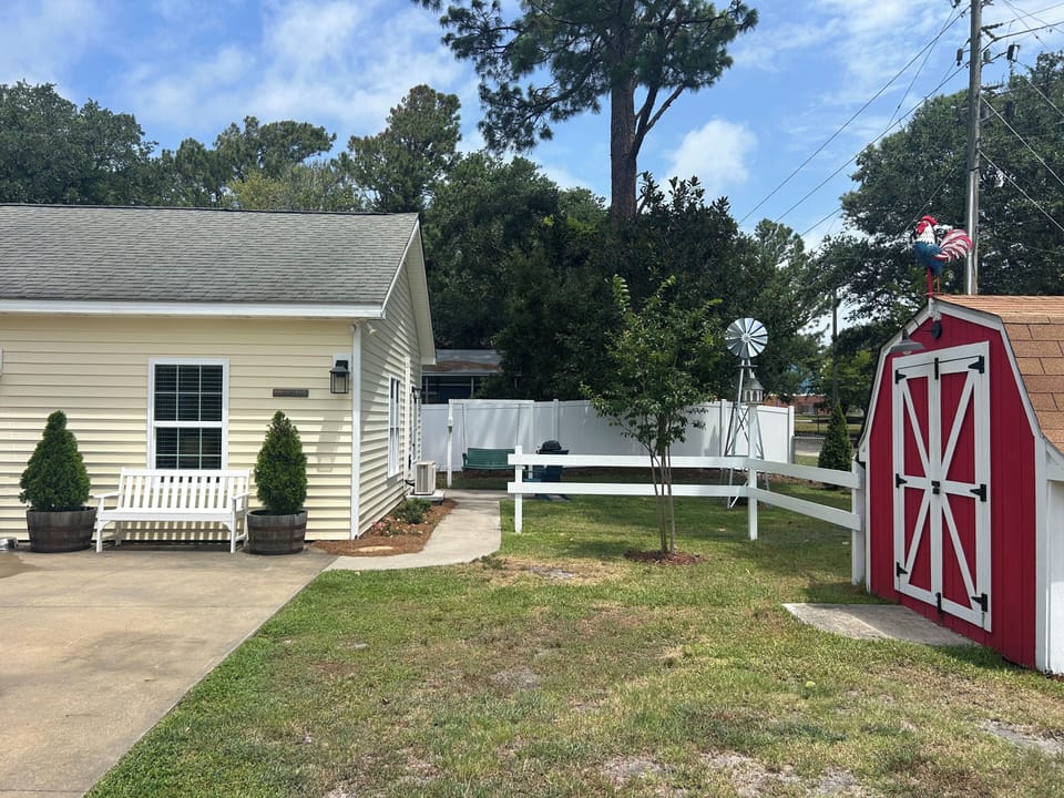 Guest parking spot and walkway to studio