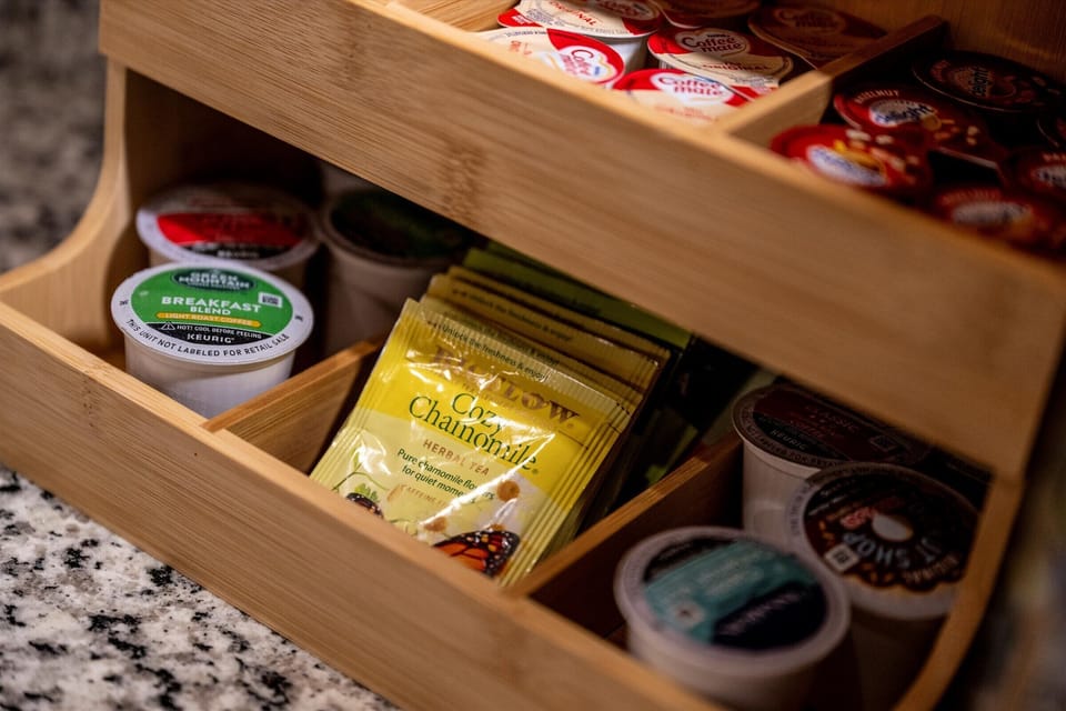 Coffee bar with pods, tea, and everything for your morning routine.