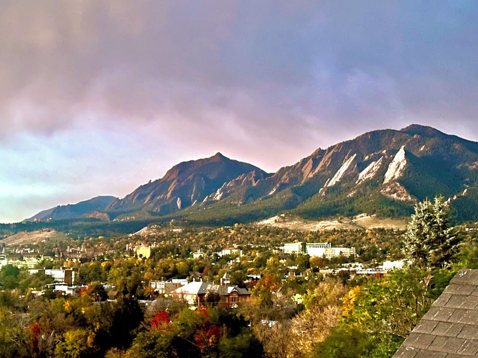 Complete view of the Boulder Flatirons and CU campus from the second floor deck