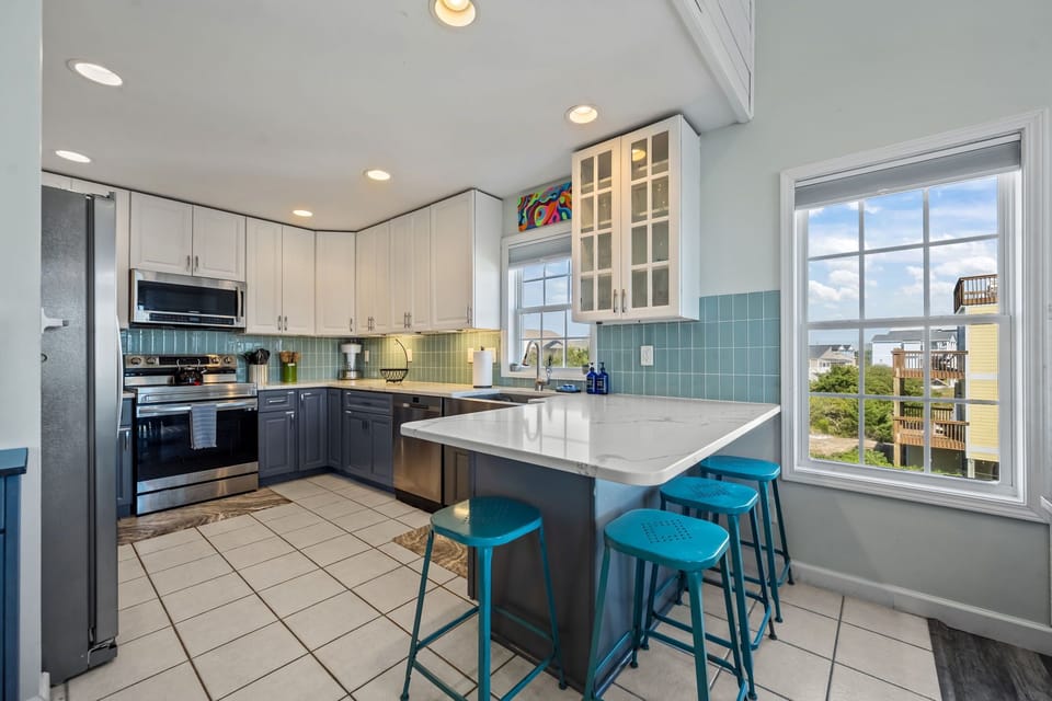 Fully equipped kitchen with everything you need to fuel beach days, from quick breakfasts to family feasts.