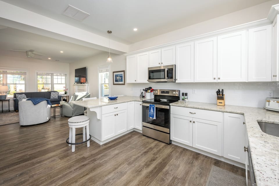Fully equipped kitchen with stainless steel appliances
