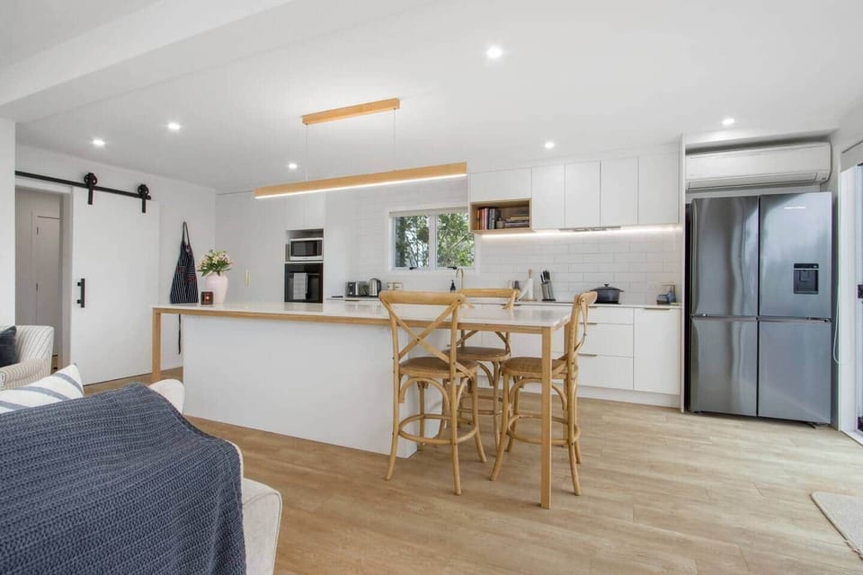 Spacious Kitchen Fitted with Large Fridge and Appliances