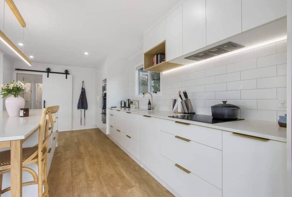 Spacious Kitchen Fitted with Large Fridge and Appliances