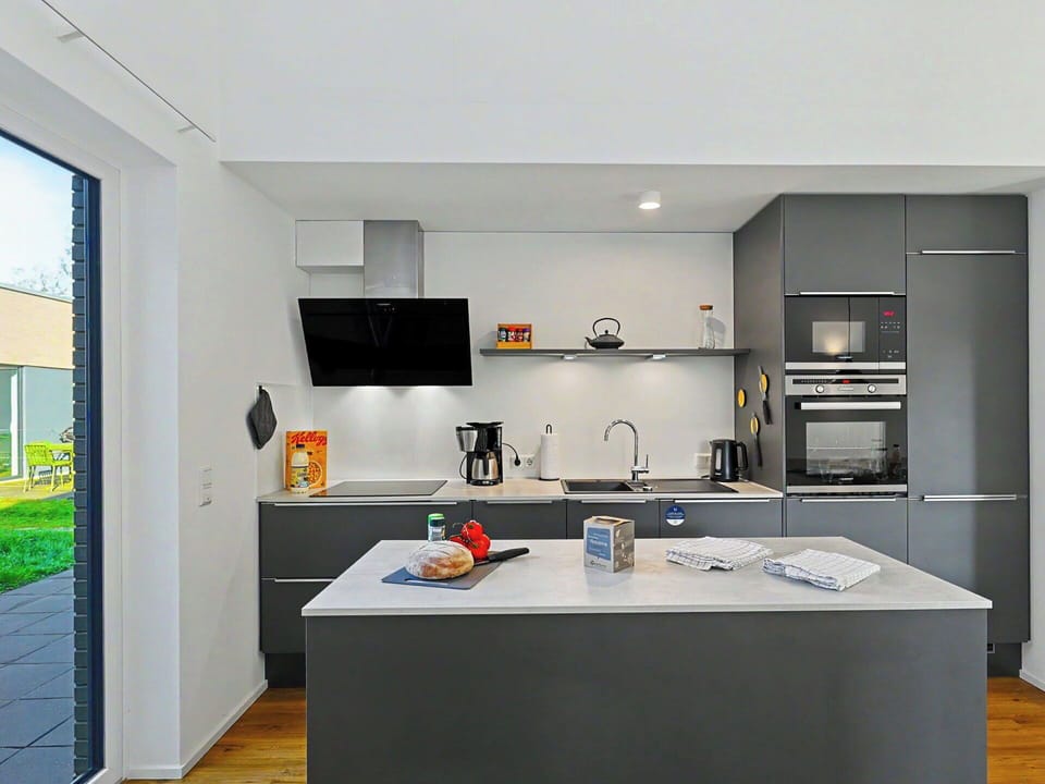 Kitchen, Kitchen Appliance, Countertop, Cabinetry, Interior Design, Major Appliance, Furniture, Home Appliance, Flooring, Kitchen Stove