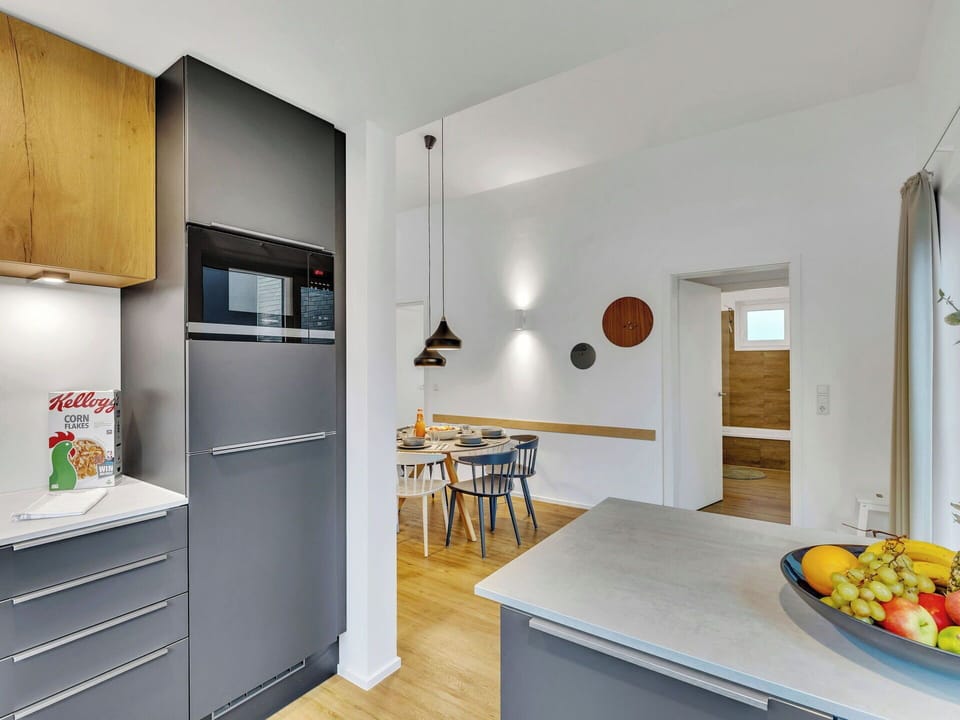 Kitchen, Interior Design, Kitchen Appliance, Furniture, Flooring, Countertop, Major Appliance, Wood, Cabinetry, Ceiling