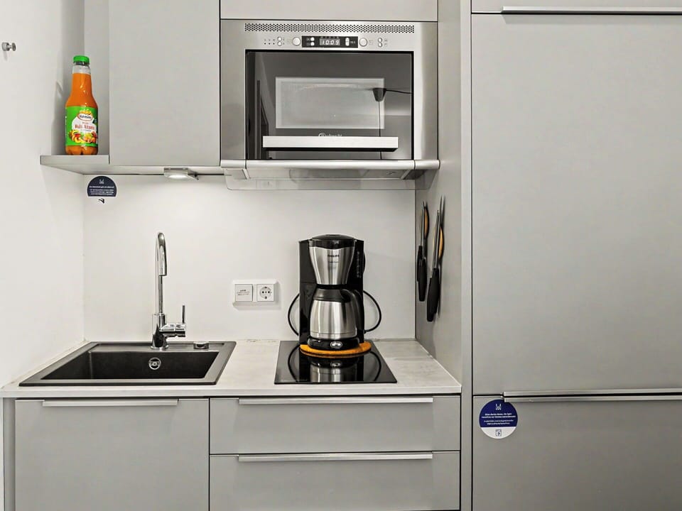 Kitchen Appliance, Kitchen, Major Appliance, Home Appliance, Cabinetry, Small Appliance, Countertop, Room, Stove, Kitchen Stove