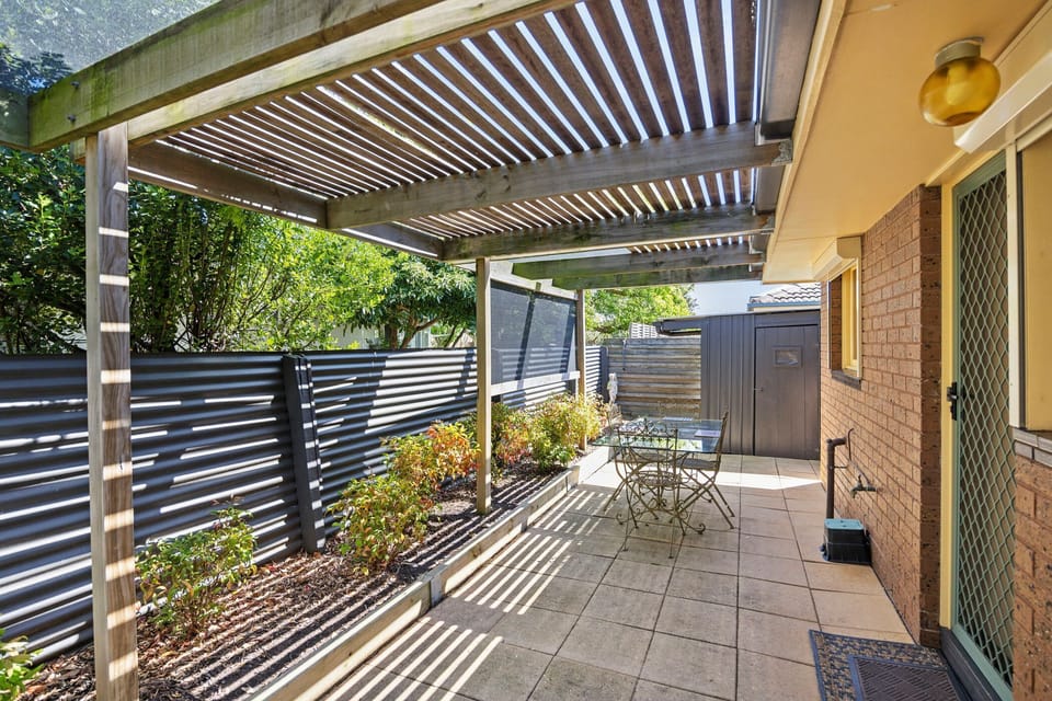 Private back Patio with outdoor dining table