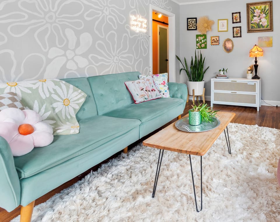 Sunny living room with flower mural!