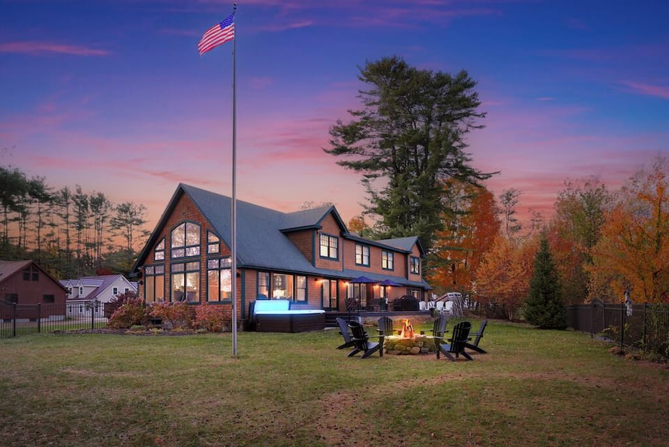 Dreamy lakeside retreat with sunset views and fireside comfort