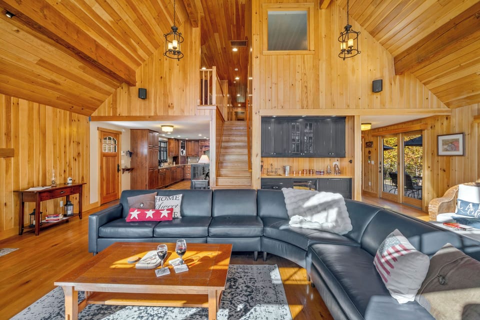 Bright seating nook with lake views and cozy blankets