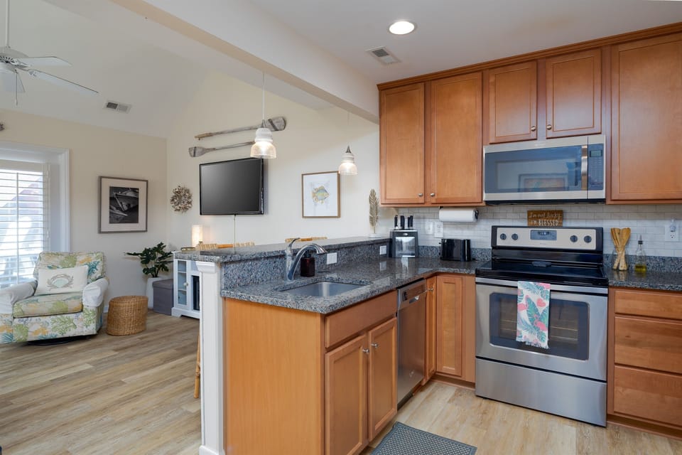 Stainless-steel appliances and sleek cabinetry 