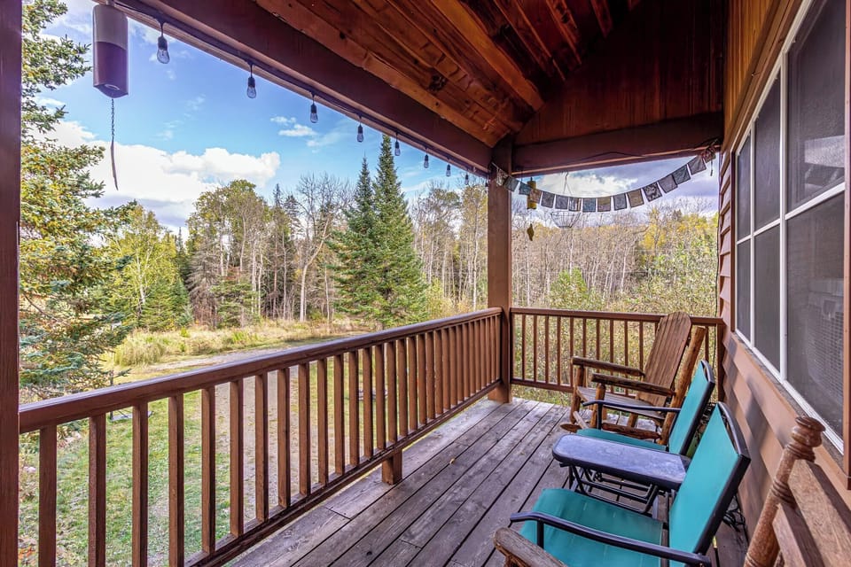 Deck off the main floor is ideal for viewing the forest. 