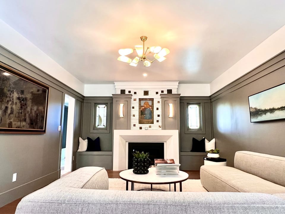 Gas fireplace with original historic tile work