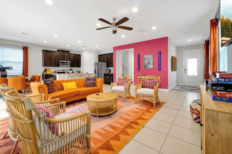 Sunlit, colorful, and thoughtfully styled—this living area blends vacation energy with all the comforts of home.
